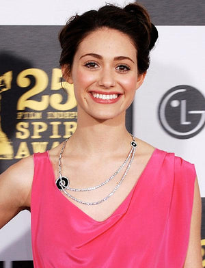 Smiling woman in a pink dress at award event, highlighting allergy-friendly nut-free lifestyle