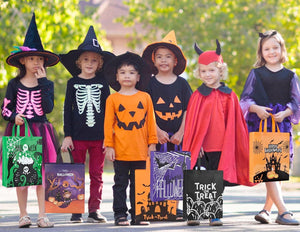Kids in Halloween costumes holding trick-or-treat bags, outdoors, nut-free candy theme