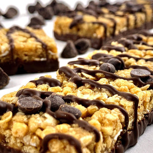 Nut-free snack bars drizzled with chocolate and chocolate chips, allergy-friendly treat