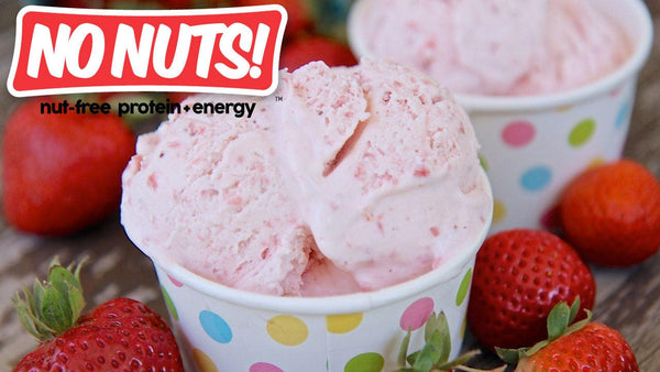 Nut-free strawberry ice cream in polka dot cups with fresh strawberries, No Nuts! branding