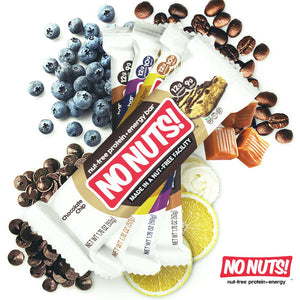 No Nuts nut-free snack bars with chocolate chips, blueberries, caramel, coffee beans, and lemon slices.