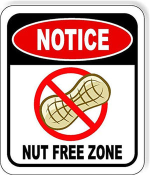 Nut-free zone notice sign with a crossed-out peanut symbol for allergy-friendly snacks