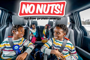 Smiling children in a car enjoying nut-free snacks, No Nuts nut-free protein energy bars banner.