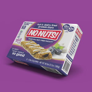 No Nuts Blueberry Vanilla nut-free protein bars box on purple background, allergy-friendly snack.